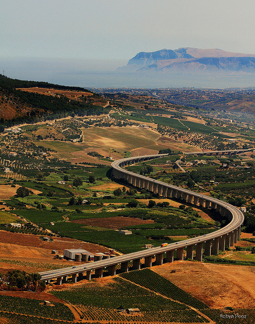 The highway viaduct seen from the temple of Segesta in Sicily, Italy